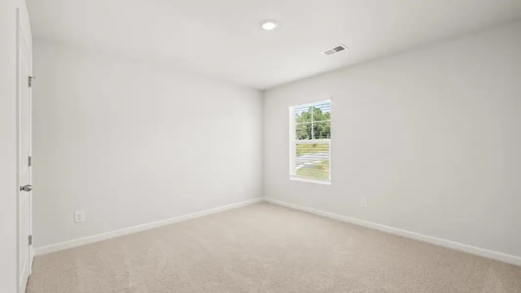 Representative unfurnished interior of a home built from the Pattison by D.R. Horton in Branford Crossing, Stockbridge (Image 22).