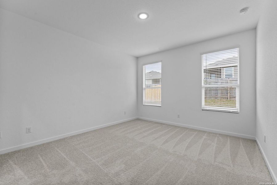 Spacious, unfurnished interior of a new home in Grace Valley, Cibolo (Image 25).