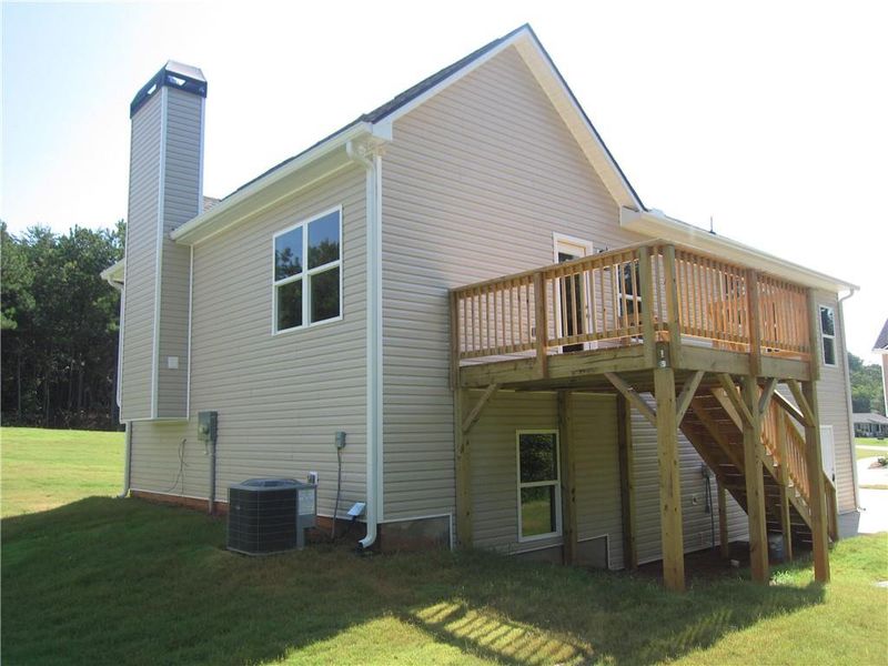 Front exterior of a new home in , Dallas, GA, highlighting curb appeal (Image 21).