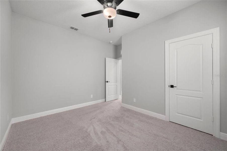Spacious, unfurnished interior of a new home in Gum Lake Preserve, Lake Alfred (Image 19).