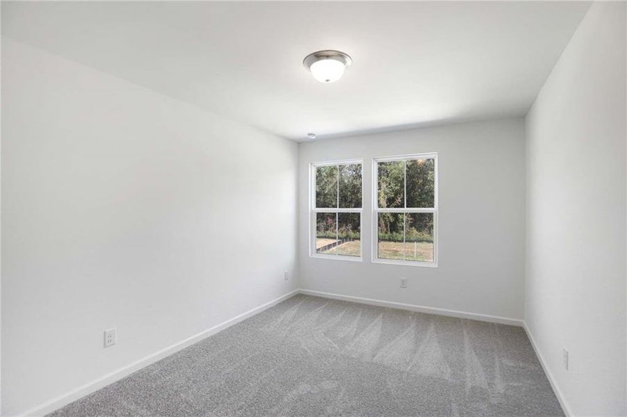 Spacious, unfurnished interior of a new home in The Pointe at Heron Bay, Locust Grove (Image 16).