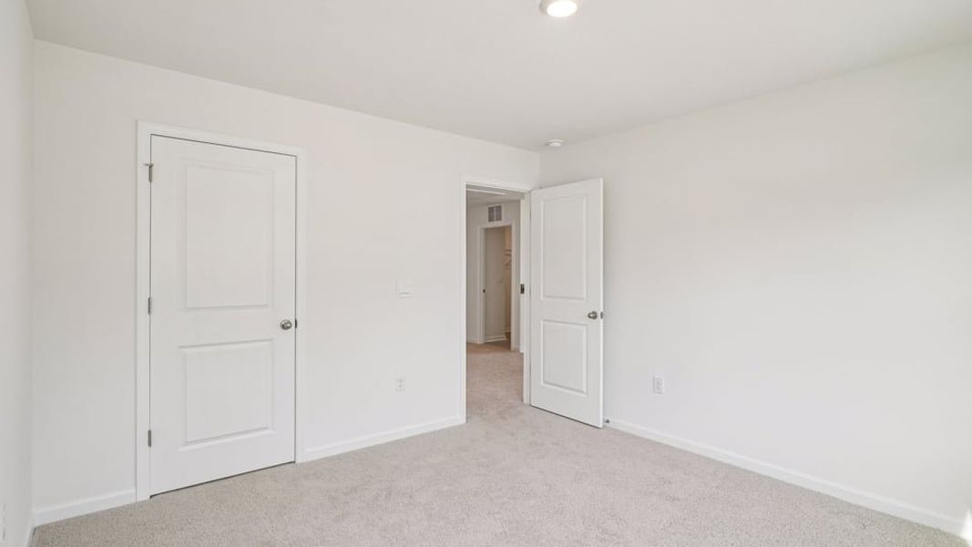 Spacious, unfurnished interior of a new home in Eagle Creek, Fuquay Varina (Image 26). Spacious, unfurnished interior of a new home in Eagle Creek, Fuquay Varina (Image 26).