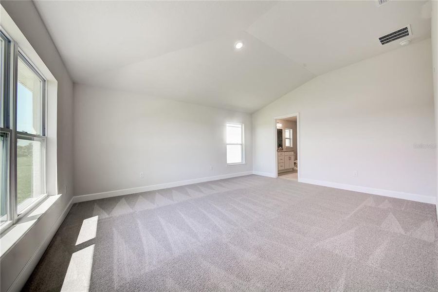 Spacious, unfurnished interior of a new home in Aviary at Rutland Ranch, Parrish (Image 14).