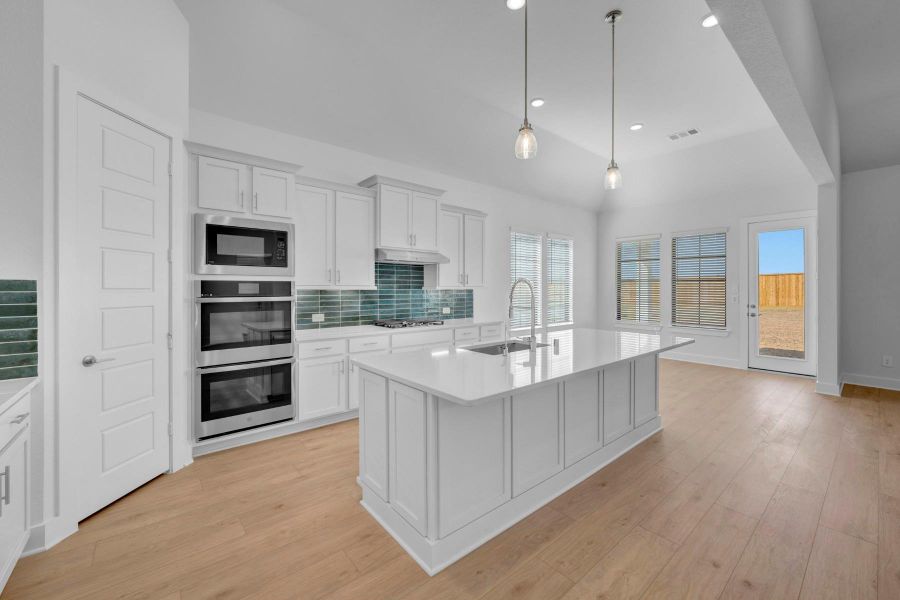 Furnished interior view inside a new home in Lone Star Landing, Montgomery (Image 9).