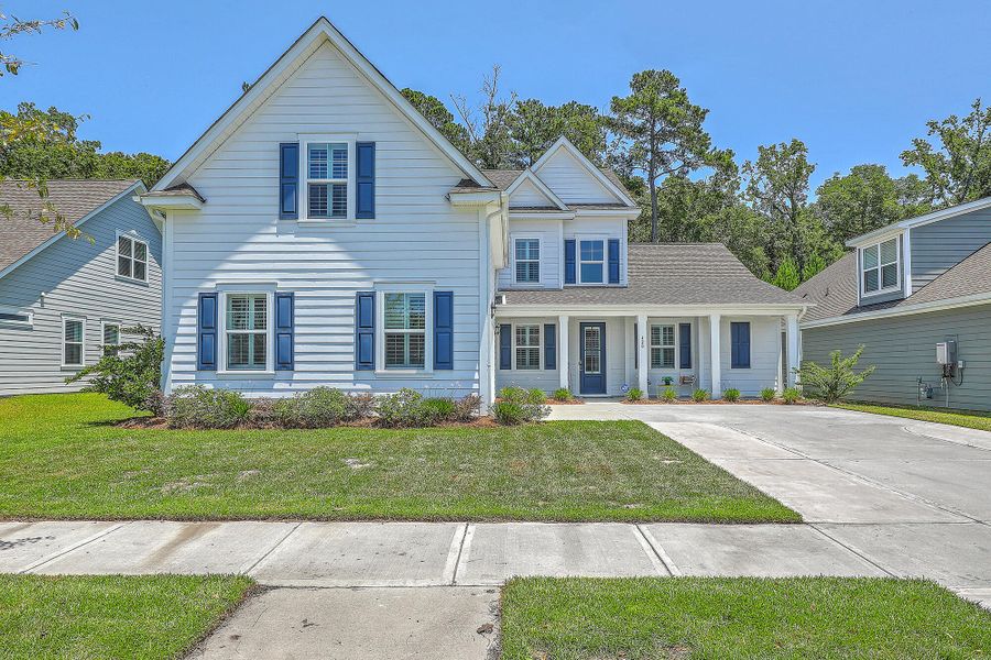 Front exterior of a new home in The Ponds, Summerville, SC, highlighting curb appeal (Image 1). Front exterior of a new home in The Ponds, Summerville, SC, highlighting curb appeal (Image 1).