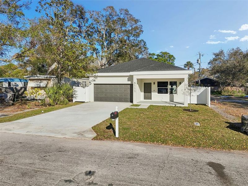 Front exterior of a new home in , St. Petersburg, FL, highlighting curb appeal (Image 27). Front exterior of a new home in , St. Petersburg, FL, highlighting curb appeal (Image 27).