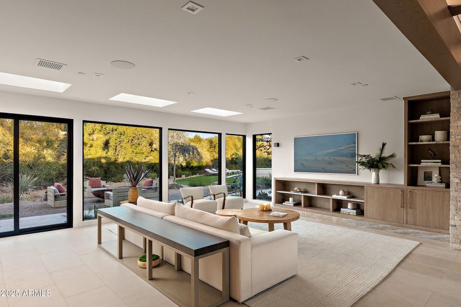 Family room overlooking pool