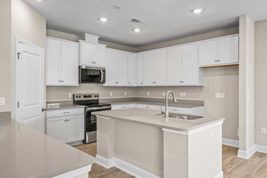 Furnished interior view inside a new home in Natureview, Freeport (Image 8).