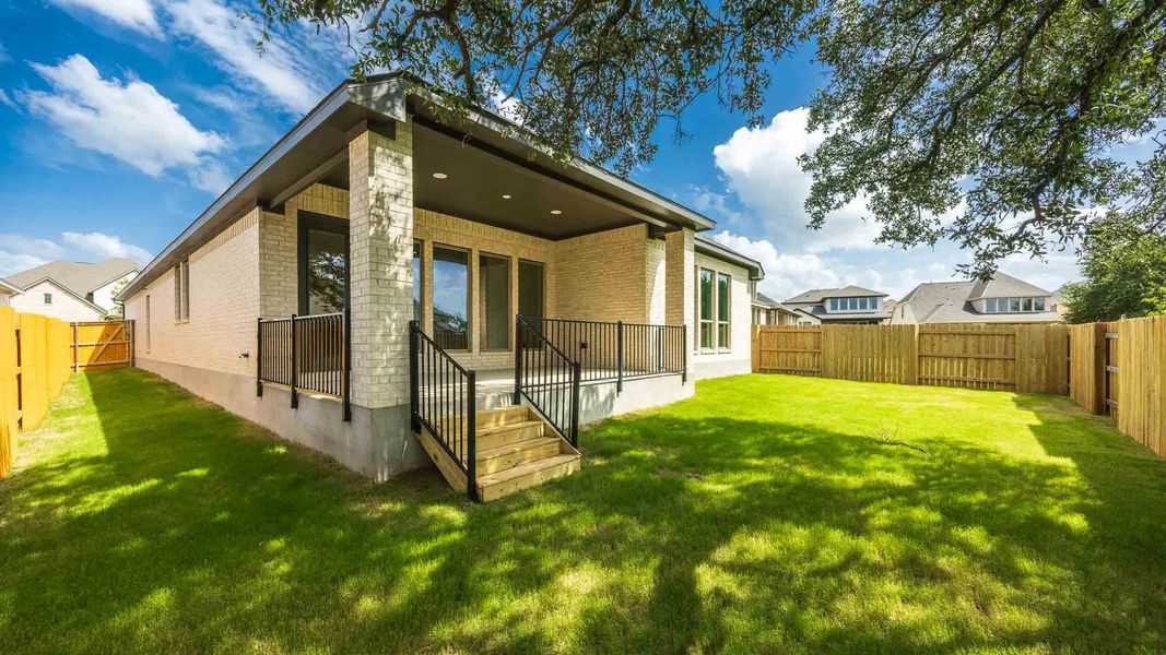 Exterior details and patio area of a home in Parkside on the River West, Georgetown (Image 2).
