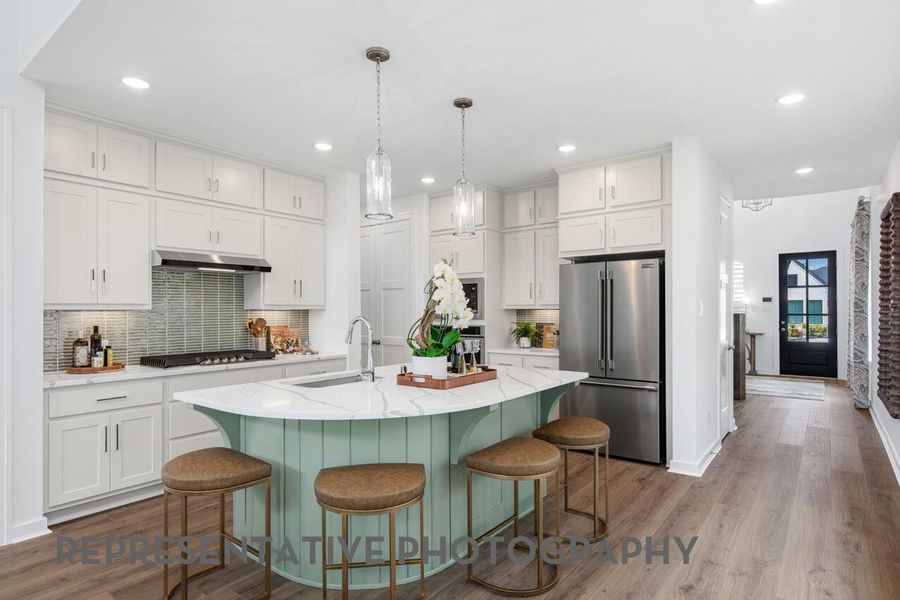 Furnished interior view inside a new home in Bridgeland, Cypress (Image 4).