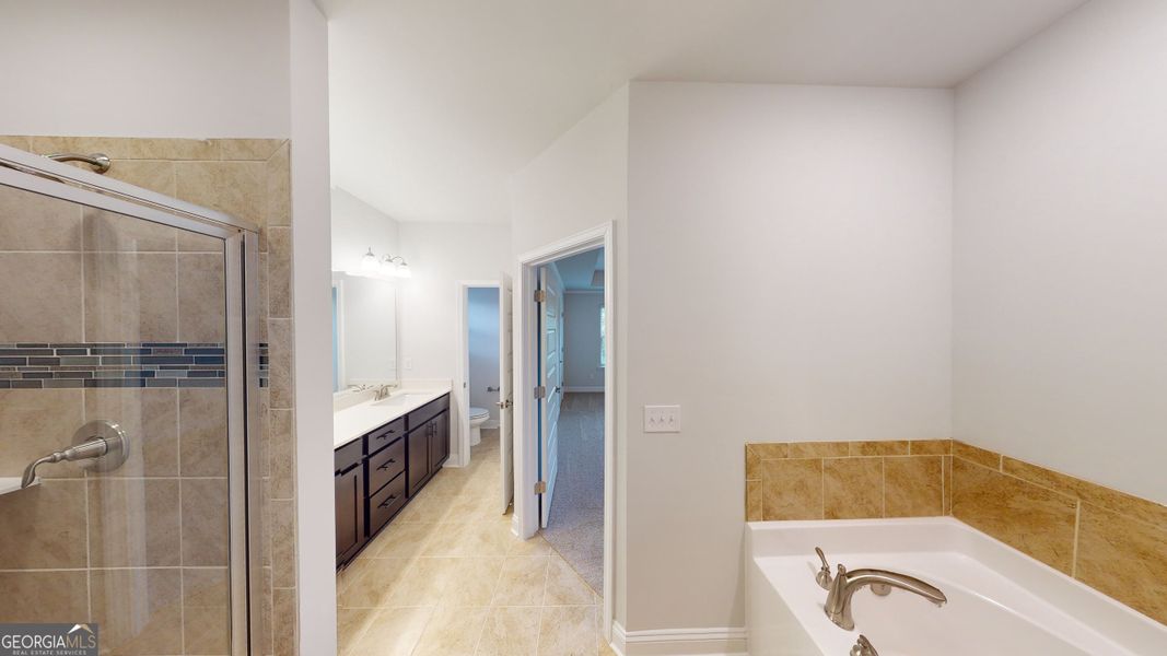 Furnished interior view inside a new home in Oakview Estates, Macon (Image 11).