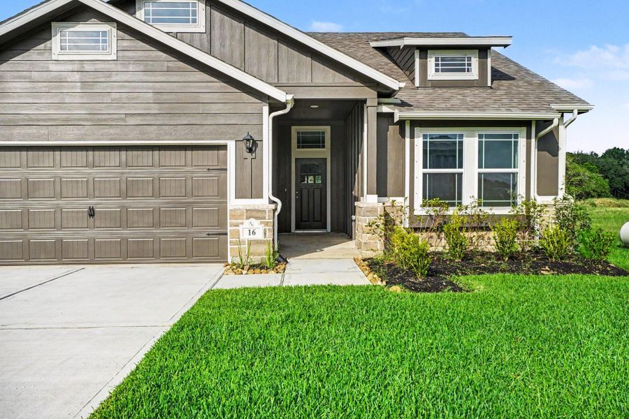Front exterior of a new home in , Bay City, TX, highlighting curb appeal (Image 21). Front exterior of a new home in , Bay City, TX, highlighting curb appeal (Image 21).