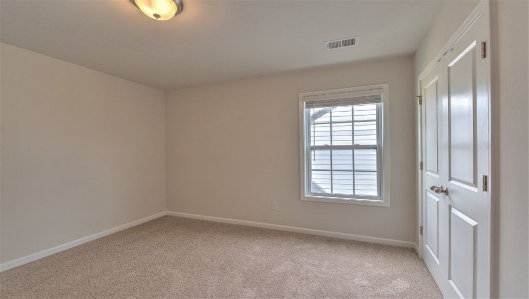Spacious, unfurnished interior of a new home in Reserve at Tap Root Farms, Fletcher (Image 28). Spacious, unfurnished interior of a new home in Reserve at Tap Root Farms, Fletcher (Image 28).