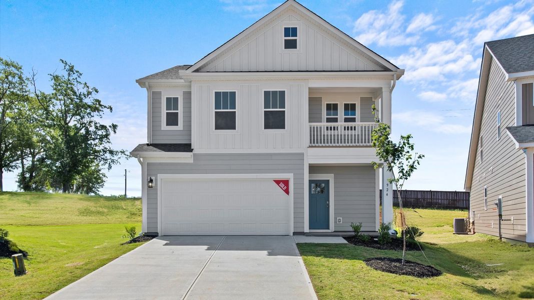 Representative exterior photo of a completed home built from the Mint by DRB Homes in Harrier Point, Woodruff, SC (Image 24).
