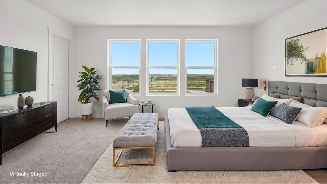 Virtually staged primary bedroom with natural light and spacious layout. Virtually staged primary bedroom with natural light and spacious layout.