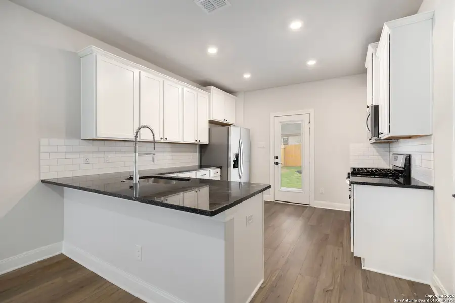 Furnished interior view inside a new home in Hightop Ridge, Converse (Image 6).