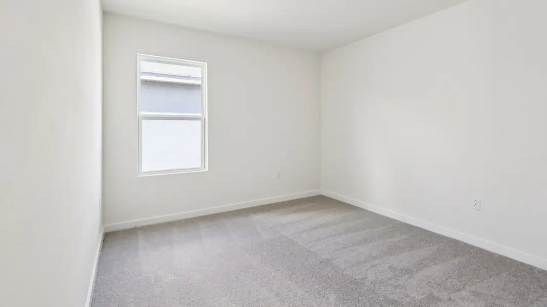 Representative unfurnished interior of a home built from the Baker by DRB Homes in Liberty Trace, Haines City (Image 28).