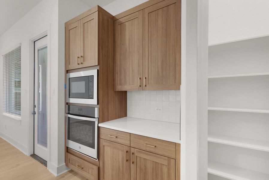 Furnished interior view inside a new home in The Grove at Blackhawk, Pflugerville (Image 9). Furnished interior view inside a new home in The Grove at Blackhawk, Pflugerville (Image 9).