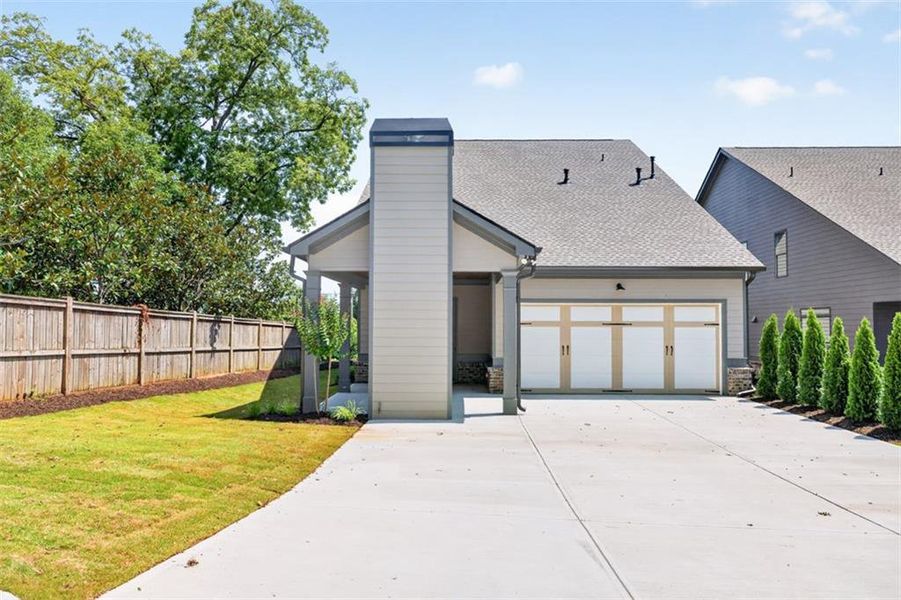 Front exterior of a new home in , Flowery Branch, GA, highlighting curb appeal (Image 33).