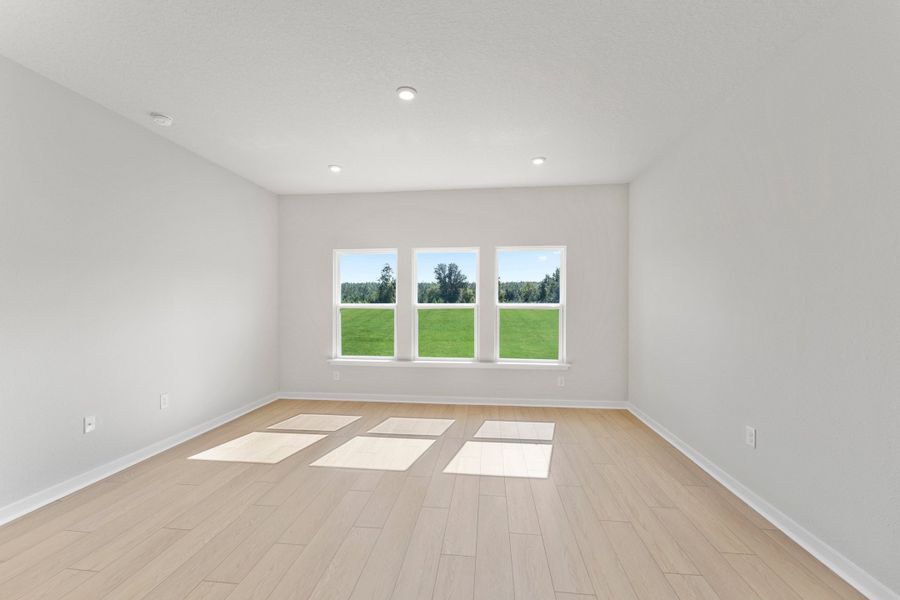 Lot 591 Living Area with Large Windows at NorthShore in Kingsland