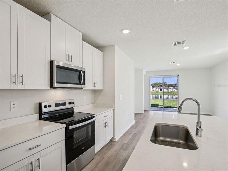 Furnished interior view inside a new home in Leyland Preserve - Premier Series, Brooksville (Image 4). Furnished interior view inside a new home in Leyland Preserve - Premier Series, Brooksville (Image 4).
