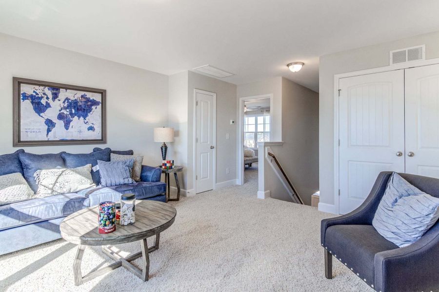 Representative furnished interior of a home built from the Drayton by Caviness & Cates Communities in Bartlett Manor, Youngsville (Image 202).