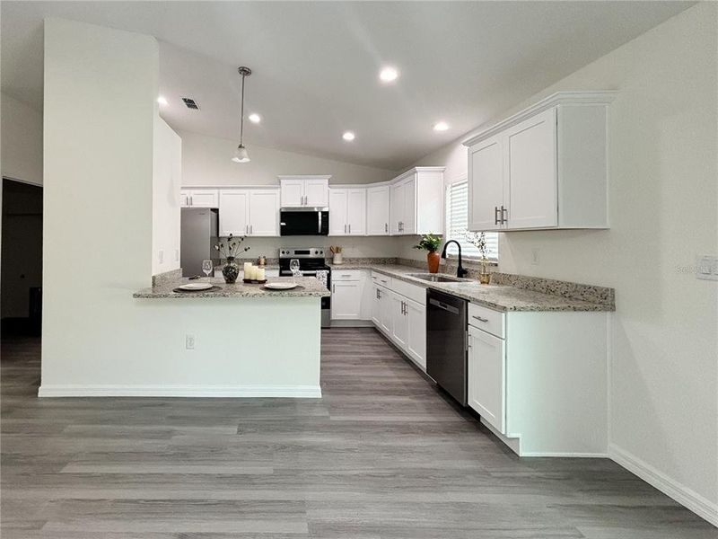 Furnished interior view inside a new home in , Dunnellon (Image 11).