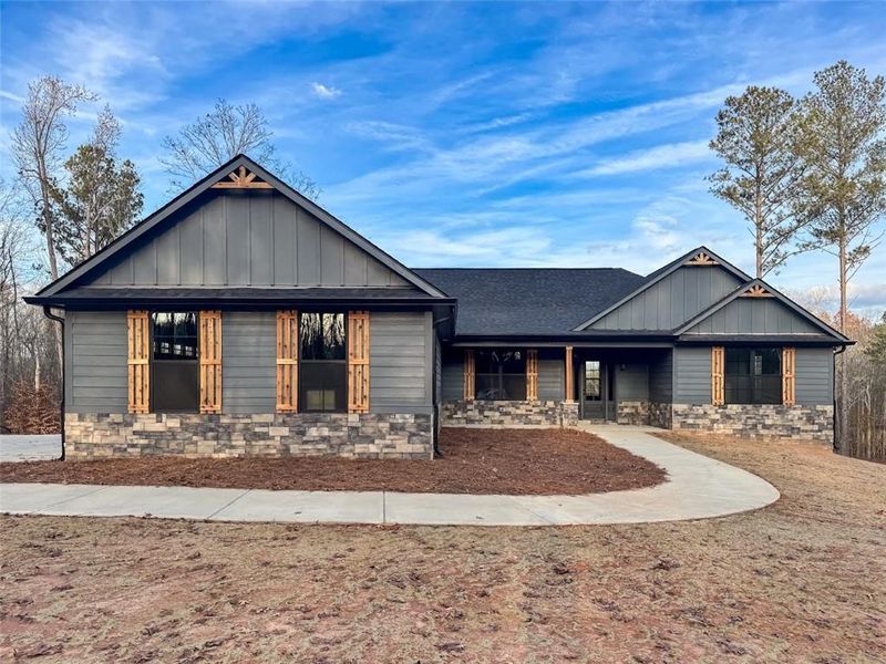 Front exterior of a new home in , Bremen, GA, highlighting curb appeal (Image 24). Front exterior of a new home in , Bremen, GA, highlighting curb appeal (Image 24).