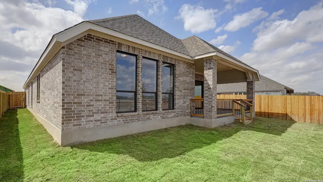 Exterior details and patio area of a home in Alsatian Oaks, Castroville (Image 4).