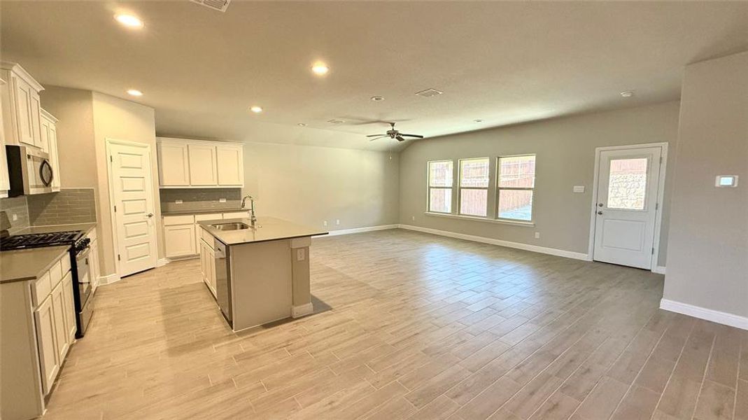 Kitchen - All Home and community information, including pricing, included features, terms, availability and amenities, are subject to change at any time without notice or obligation. All Drawings, pictures, photographs, video, square footages, floor plans, elevations, features, colors and sizes are approximate for illustration purposes only and will vary from the homes as built.