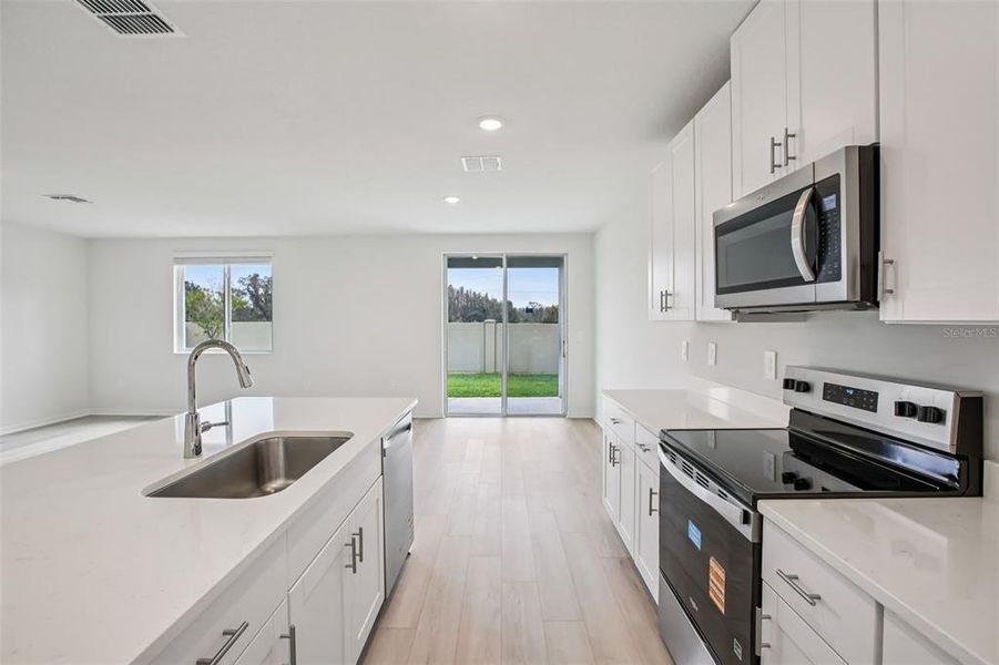 Furnished interior view inside a new home in Two Rivers - Classic Series, Zephyrhills (Image 11).