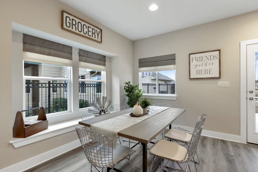 Representative furnished interior of a home built from the Houston by Pacesetter Homes in Village At Manor Commons, Manor (Image 6).