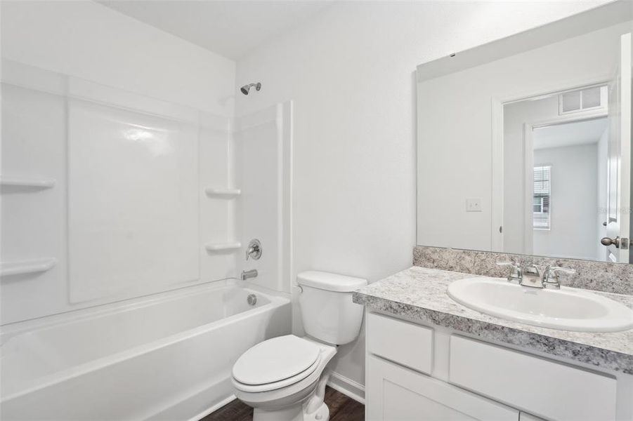 Furnished interior view inside a new home in Vista Walk, Dade City (Image 4).