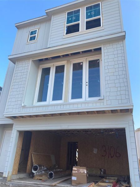 Three story home with 3 beds, 3.5 baths, and 2 car garage