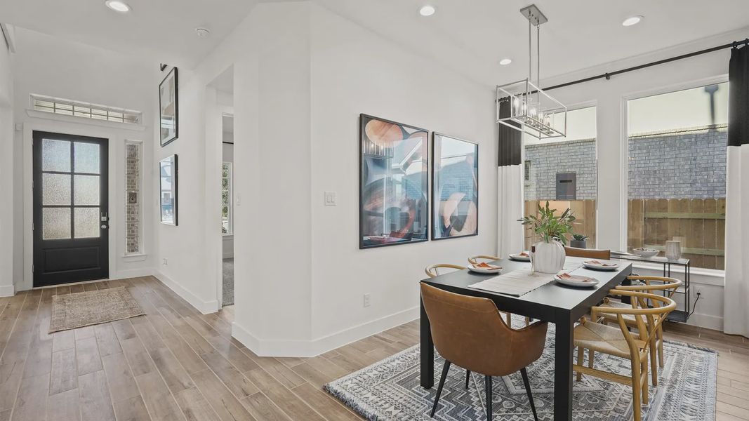 Representative furnished interior of a home built from the Medina by Chesmar Homes in Elyson 50's, Katy (Image 7).