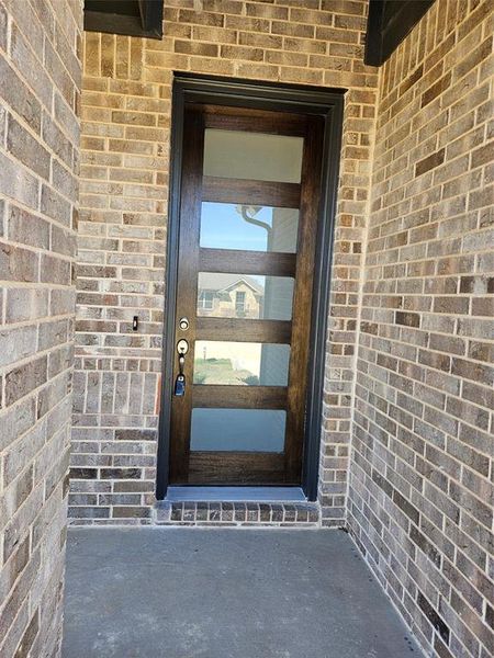Exterior details and patio area of a home in Wildcat Ridge, Godley (Image 3).