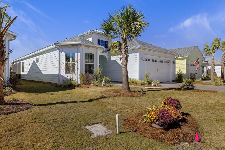 Front exterior of a new home in , Hardeeville, SC, highlighting curb appeal (Image 22).