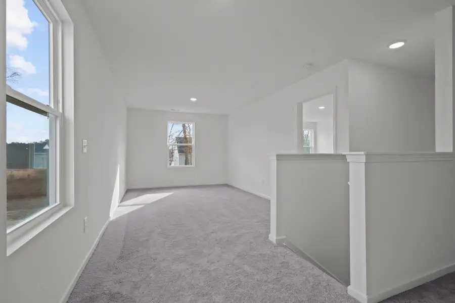 Representative unfurnished interior of a home built from the Spectra by Starlight Homes in Cordova Trails, Seguin (Image 20).