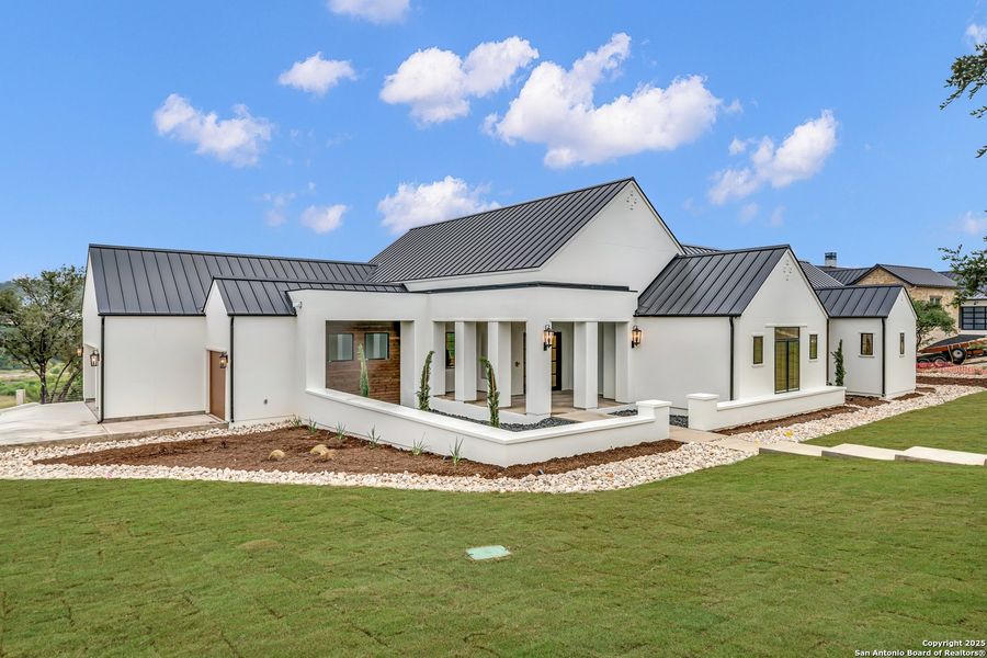 Front exterior of a new home in , San Antonio, TX, highlighting curb appeal (Image 27). Front exterior of a new home in , San Antonio, TX, highlighting curb appeal (Image 27).