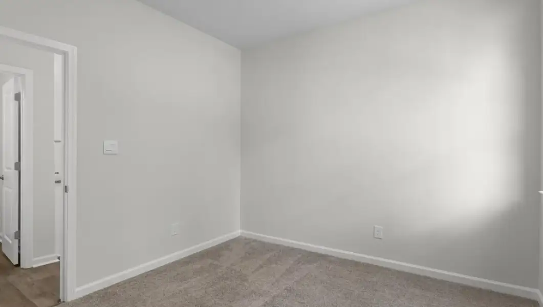 Spacious, unfurnished interior of a new home in The Highlands at Cedar Hill Landing, Navassa (Image 21).