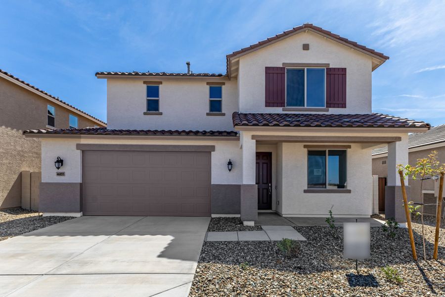 Front exterior of a new home in Elara at Moonlight, Maricopa, AZ, highlighting curb appeal (Image 1). Front exterior of a new home in Elara at Moonlight, Maricopa, AZ, highlighting curb appeal (Image 1).