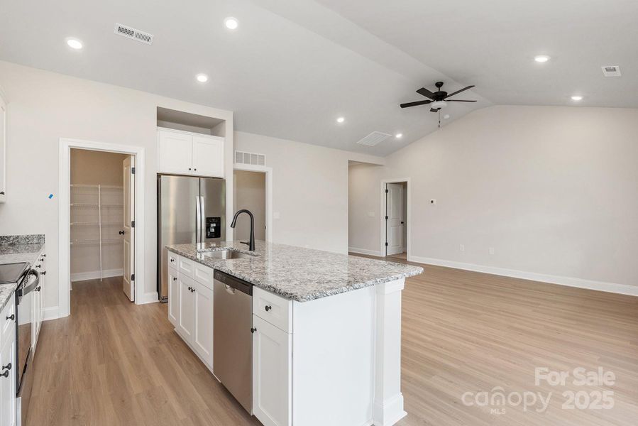 Furnished interior view inside a new home in Stagecoach Station, Gastonia (Image 4).