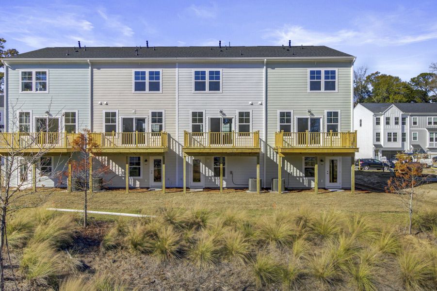 Exterior details and patio area of a home in , Johns Island (Image 26).