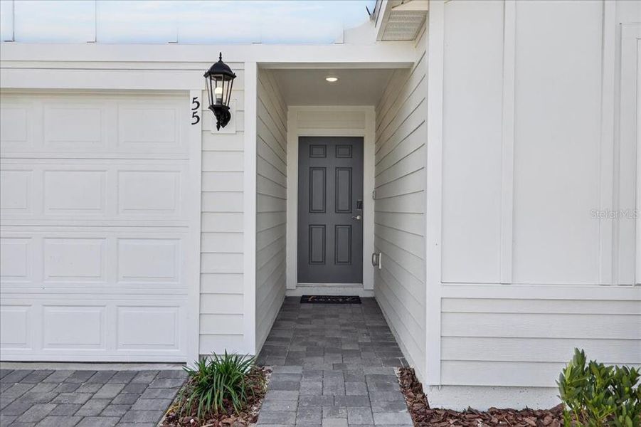 Exterior details and patio area of a home in Colbert Landings, Palm Coast (Image 24).