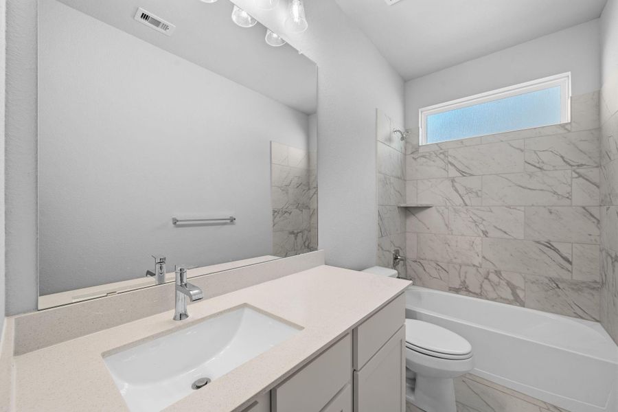 Furnished interior view inside a new home in Barton Creek Ranch, Conroe (Image 8).