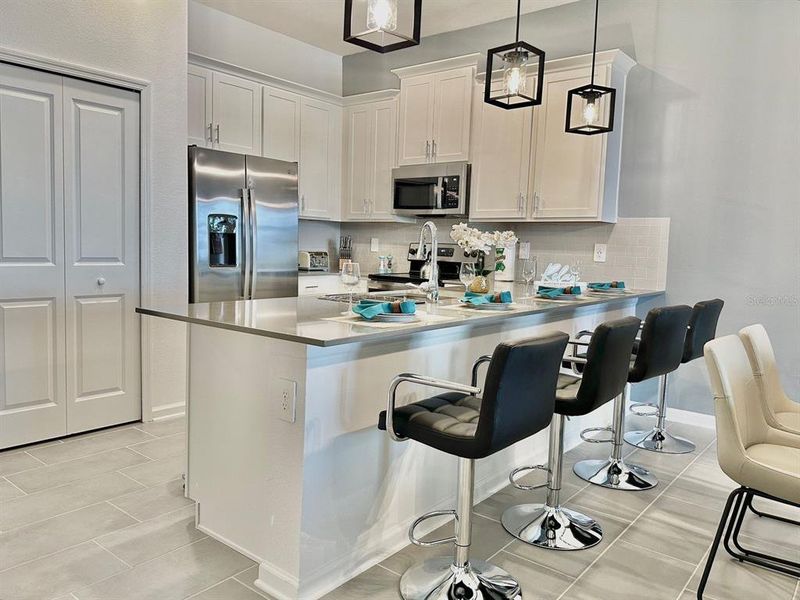 Furnished interior view inside a new home in , Davenport (Image 12).