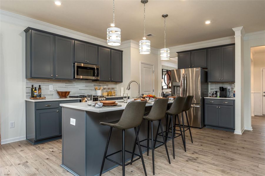 The Palmer- Kitchen. The sample image is a staged model, to be used for illustrative purposes only. Upgrades, options, and colors will vary. The Palmer- Kitchen. The sample image is a staged model, to be used for illustrative purposes only. Upgrades, options, and colors will vary.