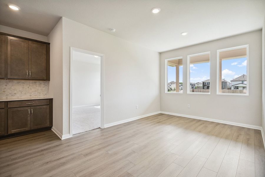 Representative unfurnished interior of a home built from the Blake by Ashton Woods in Rolling Glen, Hutto (Image 22).