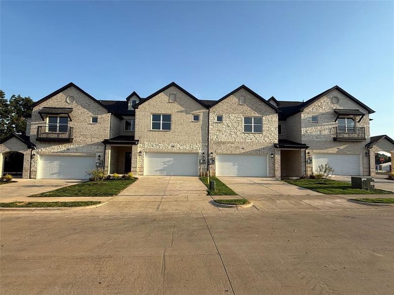 Front exterior of a new home in , Grand Prairie, TX, highlighting curb appeal (Image 1). Front exterior of a new home in , Grand Prairie, TX, highlighting curb appeal (Image 1).
