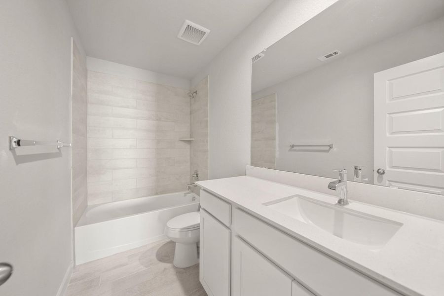 Furnished interior view inside a new home in Cypresswood Landing, Humble (Image 9).